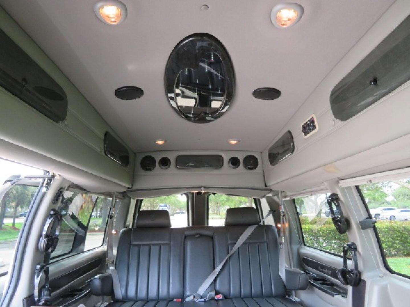 2010 White /Gray Chevrolet Express (1GNUGCD48A1) , located at 4301 Oak Circle #19, Boca Raton, FL, 33431, (954) 561-2499, 26.388861, -80.084038 - You are looking at a Gorgeous 2010 Chevy Express Handicap Wheelchair Conversion Van Explorer Limited SE with 31K Original Miles, Braun Century 750lb Side Entry Wheelchair lift, Tie Down System in the Floor, Rear Entertainment with Flat Screen TV/DVD, Leather Interior, Rear Power Folding Bench Seat/b - Photo#52